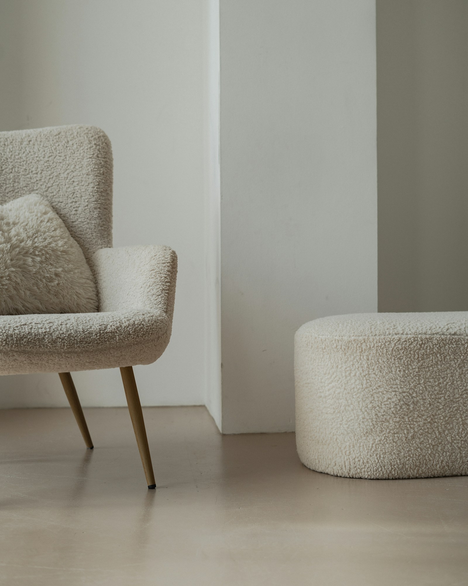 A calm, private treatment space in warm, neutral tones
