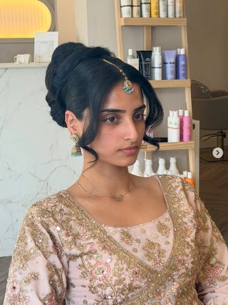 Elegant occasion hair up with jewellery detailing